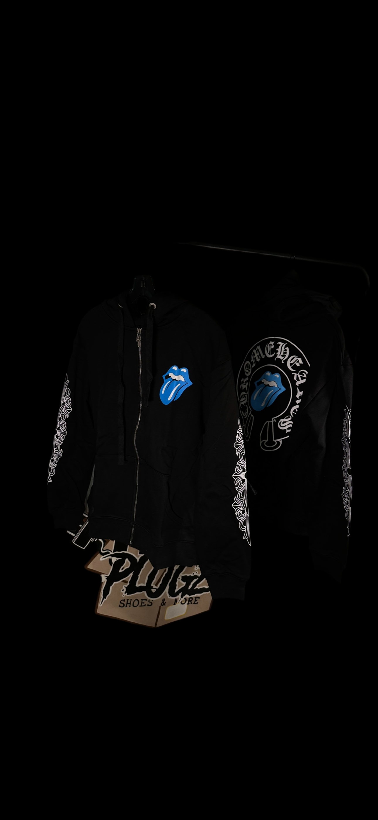 Black zip blue tounge out chrome heart zip