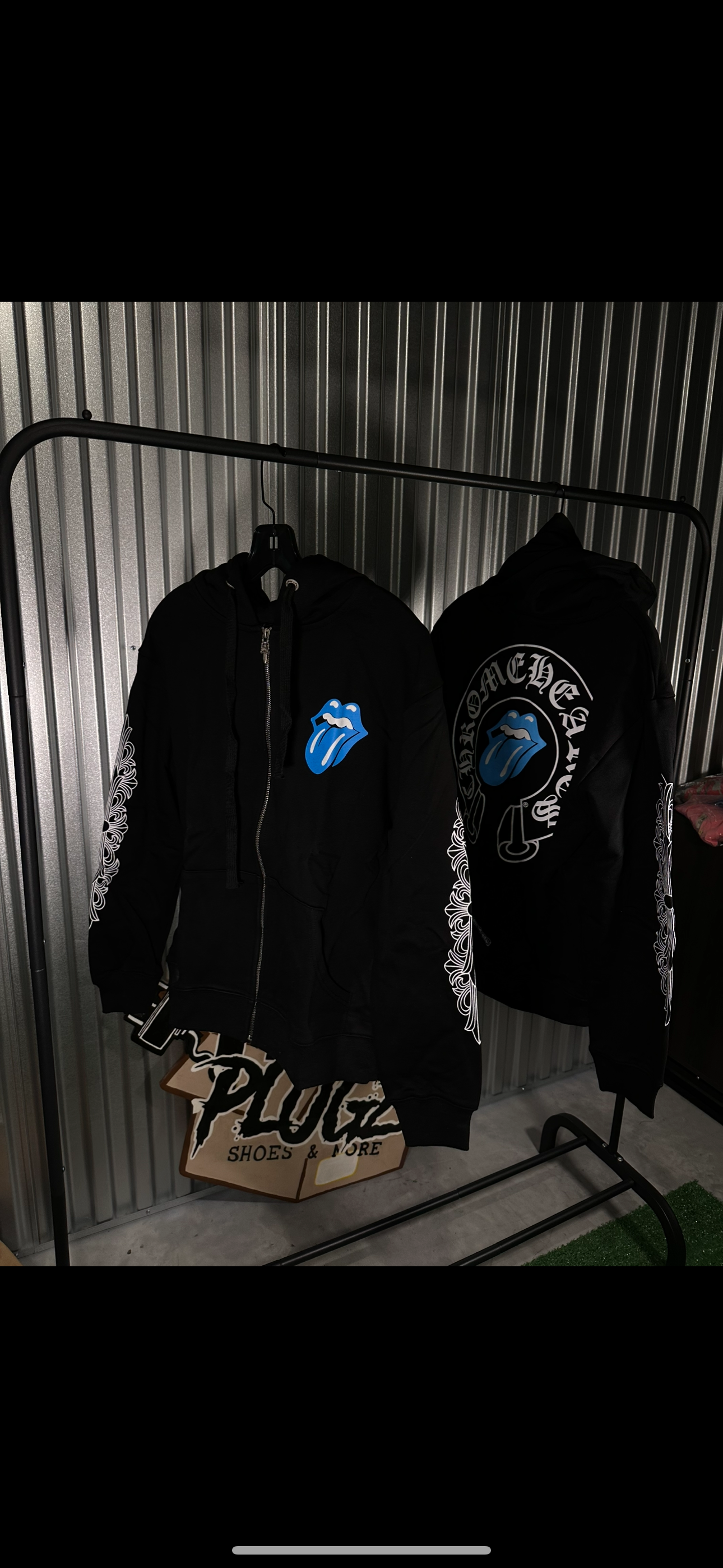 Black zip blue tounge out chrome heart zip